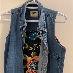 Denim vest with floral pattern
